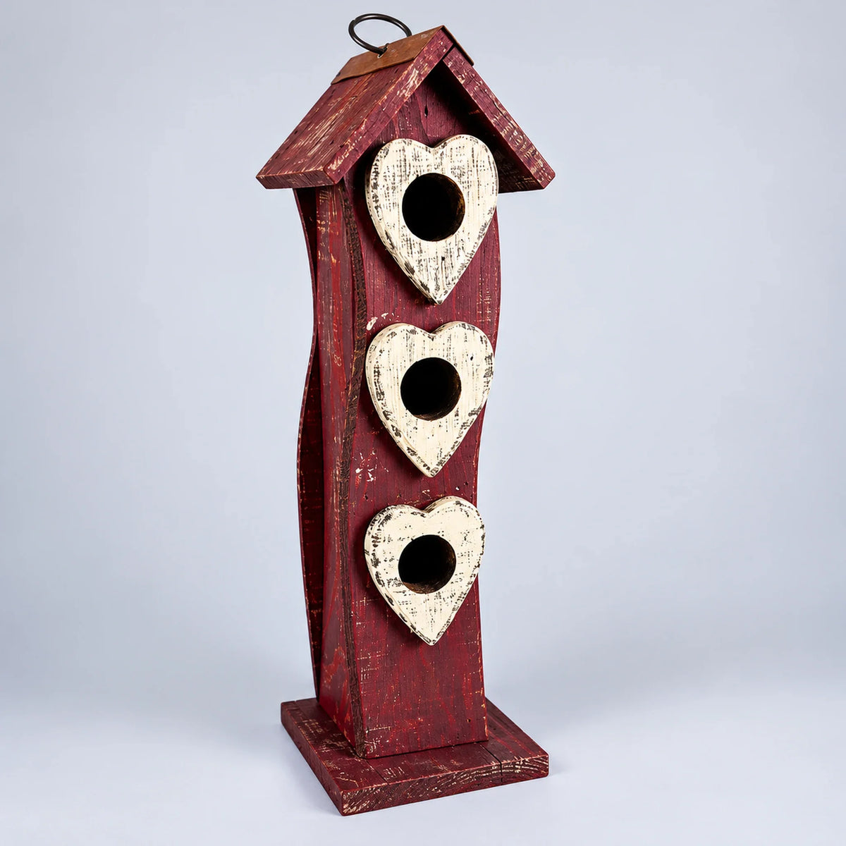 Burgundy red tall slim birdhouse with three heart entrances